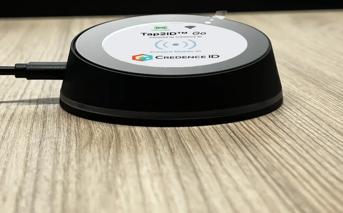 Side view of Tap2iD Go showing its low profile and weighted base